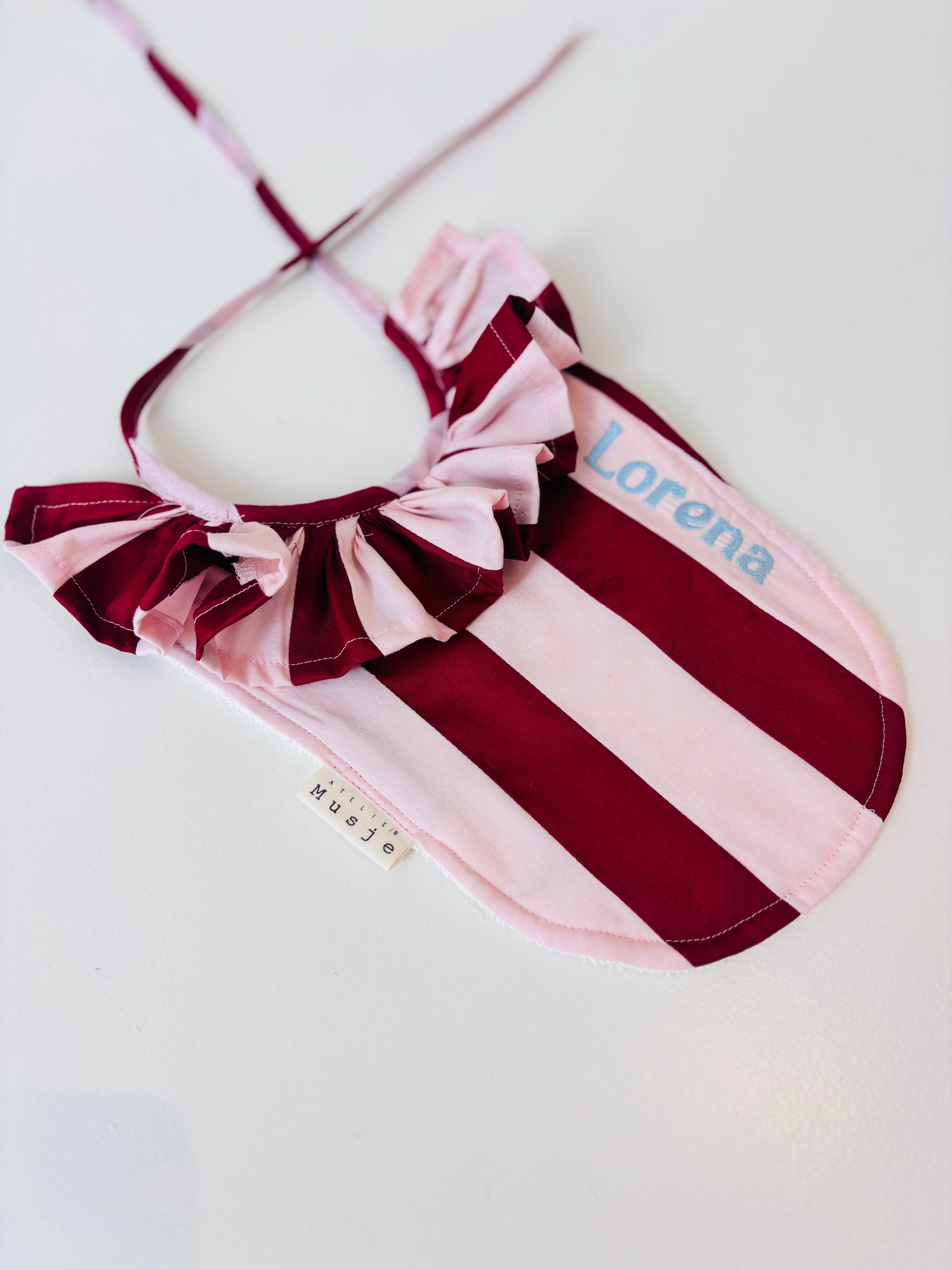 Slabbetje Stripes - Rood/roze