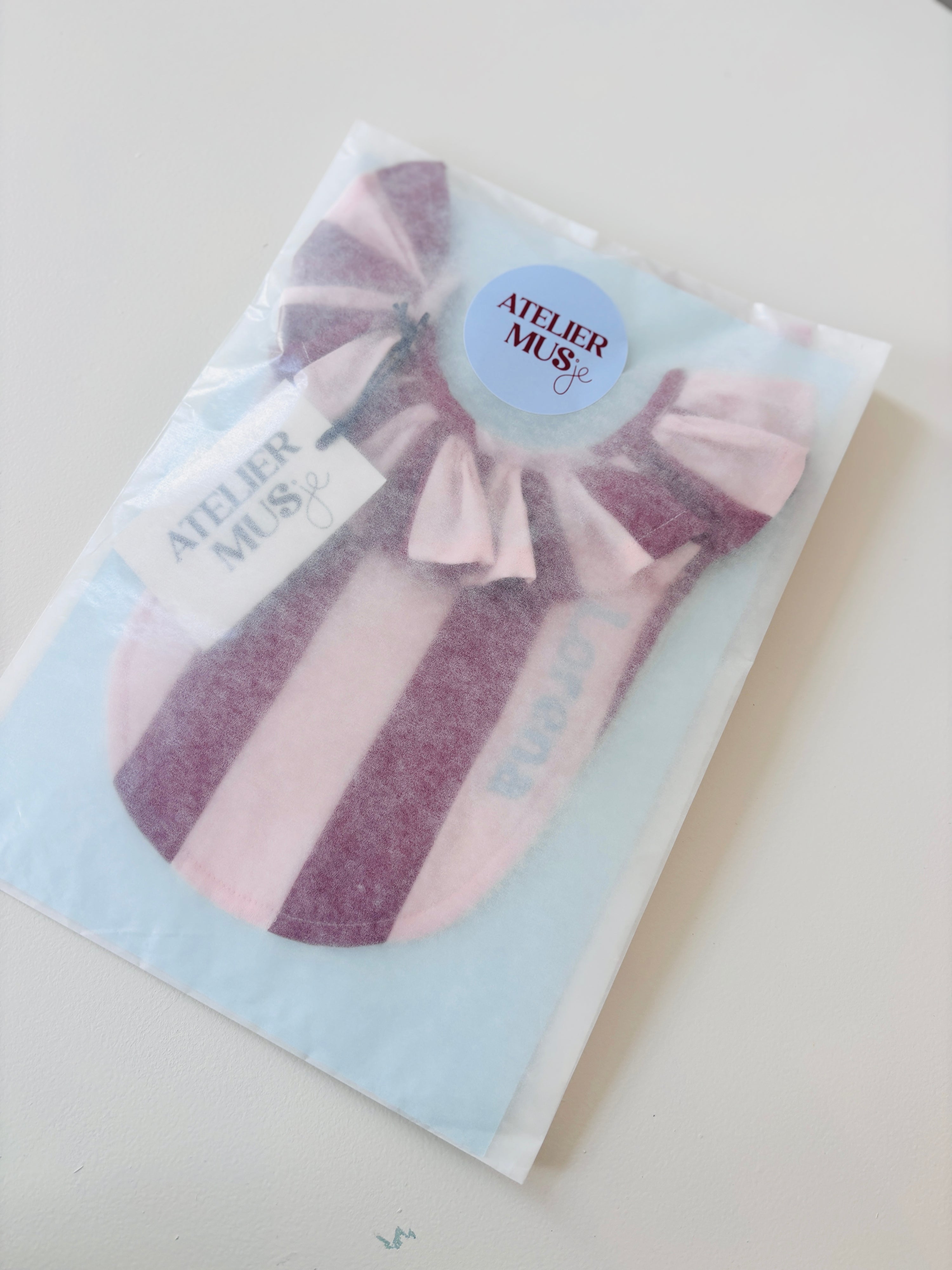 Slabbetje Stripes - Rood/roze